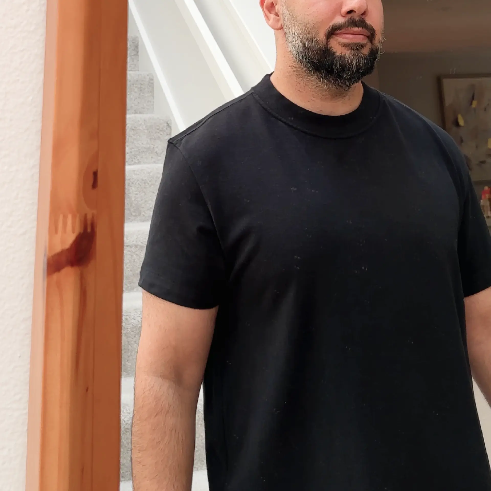 Close-up of the Delmade T-shirt shoulder and sleeve