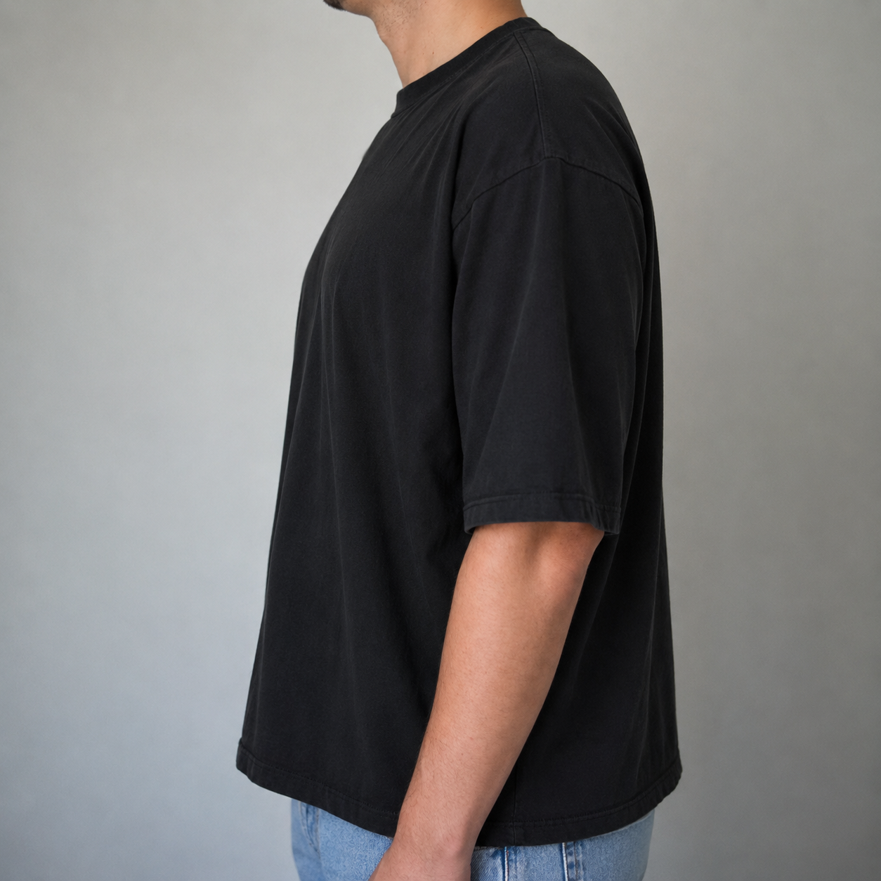 Man wearing a baggy, too loose heavyweight t-shirt