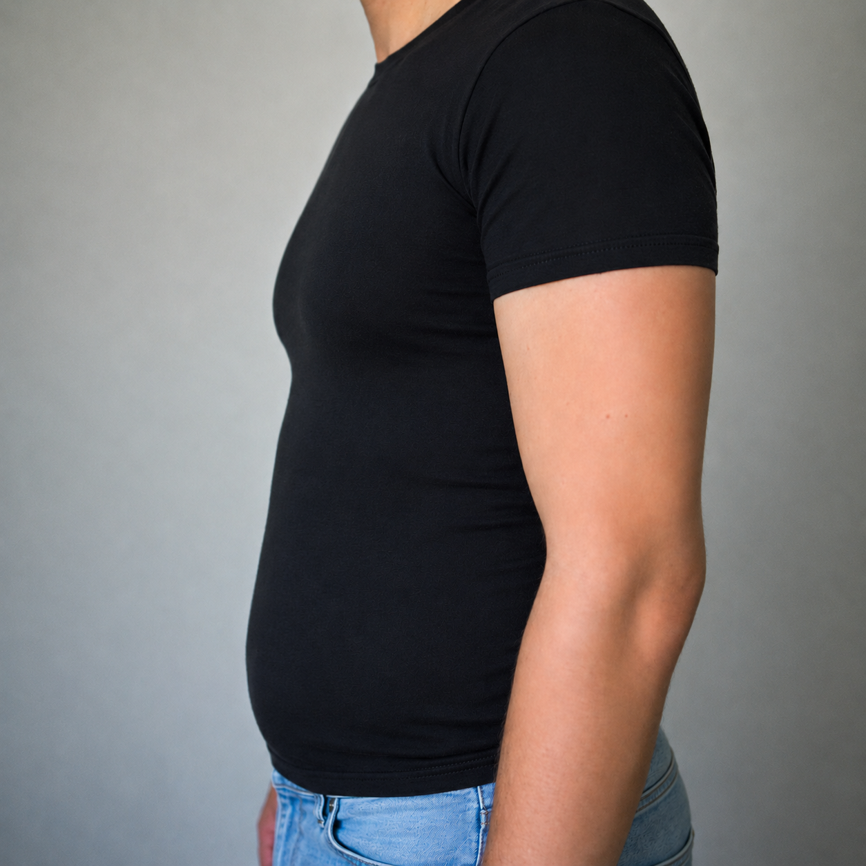 Man wearing a t-shirt that is visibly too tight